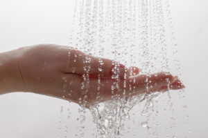 Water streaming over a hand