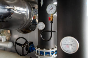 Gauges on a commercial boiler system.