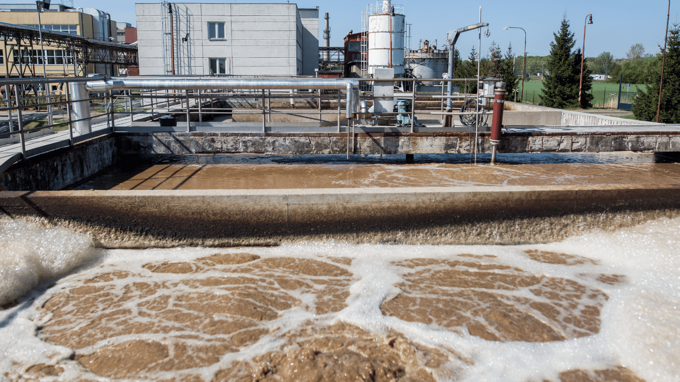 Industrial wastewater treatment facility illustrating chlorine dioxide odor control for odor removal, unpleasant odors, foul smells, and organic odors.
